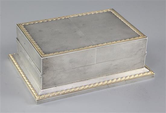 A good George V engine turned parcel gilt silver double lidded rectangular playing card box by Asprey & Co Ltd, 17.7cm.